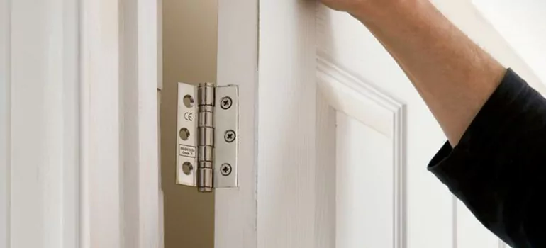 Bathroom Stall Door Hinge Repair in Abbotsford, BC